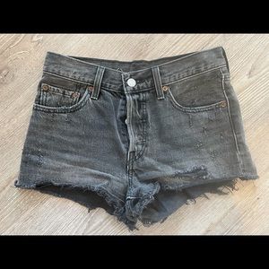 Levi’s high waisted black distressed shorts